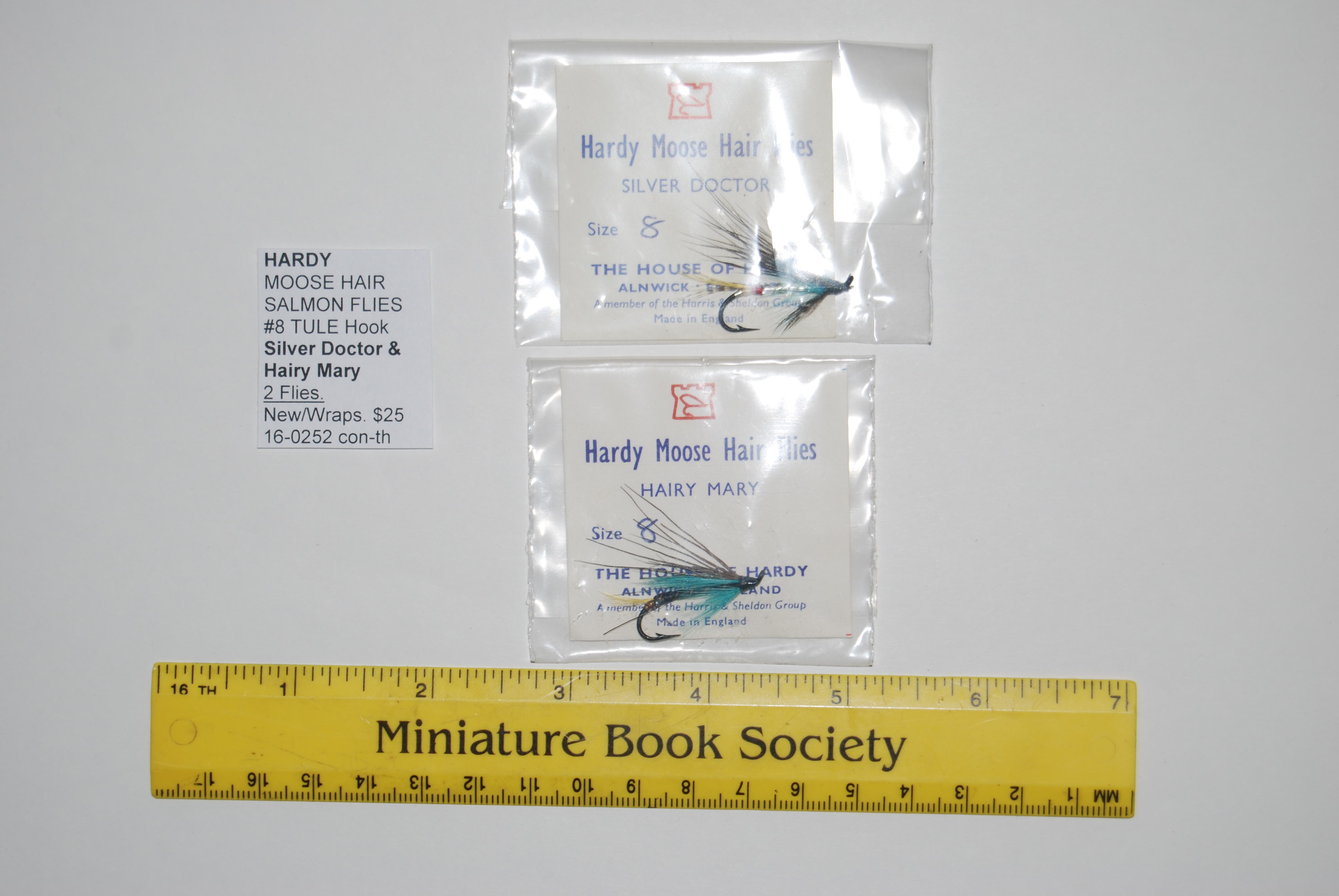 HARDY MOOSE HAIR SALMON FLIES. #8 Hook TULE. In Hardy-marked flier & plastic cover. 2 Flies: Silver Doctor & Hairy Mary. Image for HARDY MOOSE HAIR SALMON FLIES. #8 Hook TULE. In Hardy-marked flier & plastic cover. 2 Flies: Silver Doctor & Hairy Mary.
